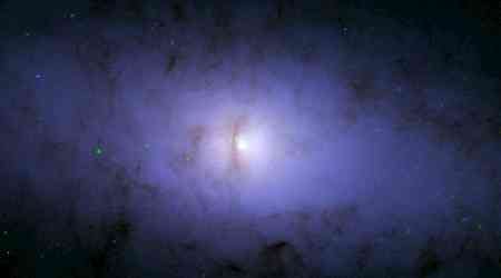 Hubble and Chandra Telescopes Spot Strange Tilted Black Hole in Galaxy NGC 5084