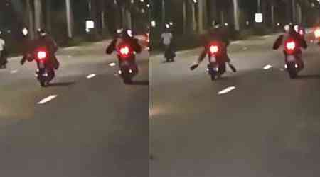 'Stupid rider doing stupid stunt': Motorcyclist caught doing 'Superman' pose along ECP