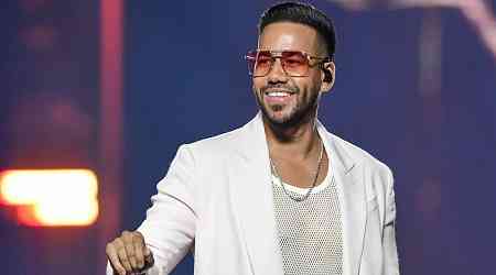 Couple divorce after wife kisses Romeo Santos onstage at an Aventura gig