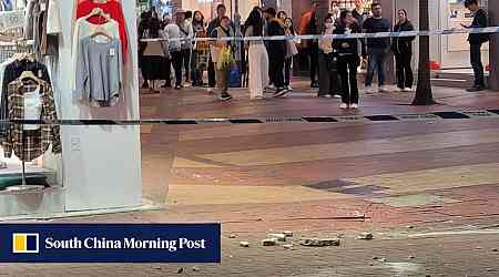 Elderly man hit by chunks of falling concrete from Hong Kong building