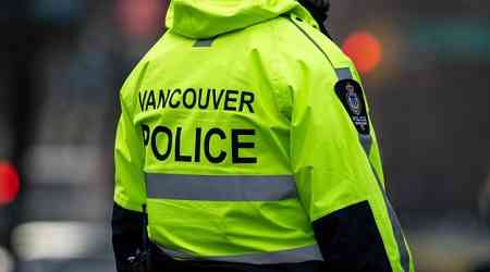 Vancouver police use dog to arrest armed man hiding in dumpster