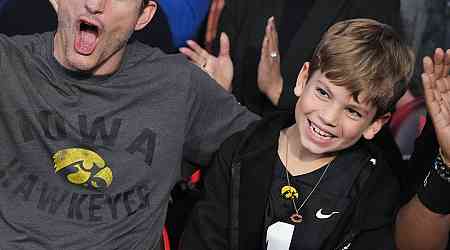  Ashton Kutcher and 8-Year-Old Son Dimitri Enjoy Outing at WWE Event 