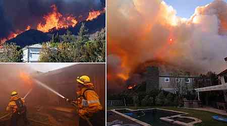 Wildfire rips through upscale coastal community as 20,000 residents evacuate