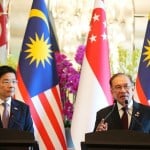 Malaysian and Singapore agree to launch a special economic zone in a rare move to attract investors