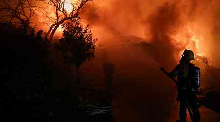 Los Angeles wildfires live news: Tens of thousands flee homes in California