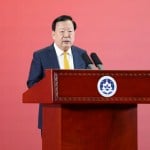 Xia Baolong urges Macau to achieve greater international recognition