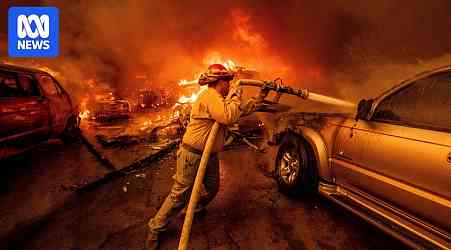 Apocalyptic scenes as wildfires tear through Los Angeles