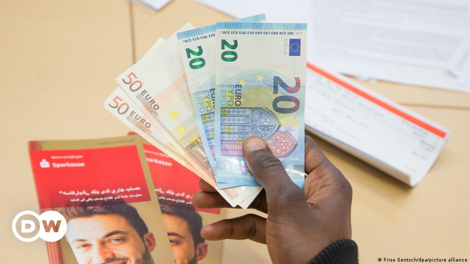 German government mulls limiting migrant remittances
