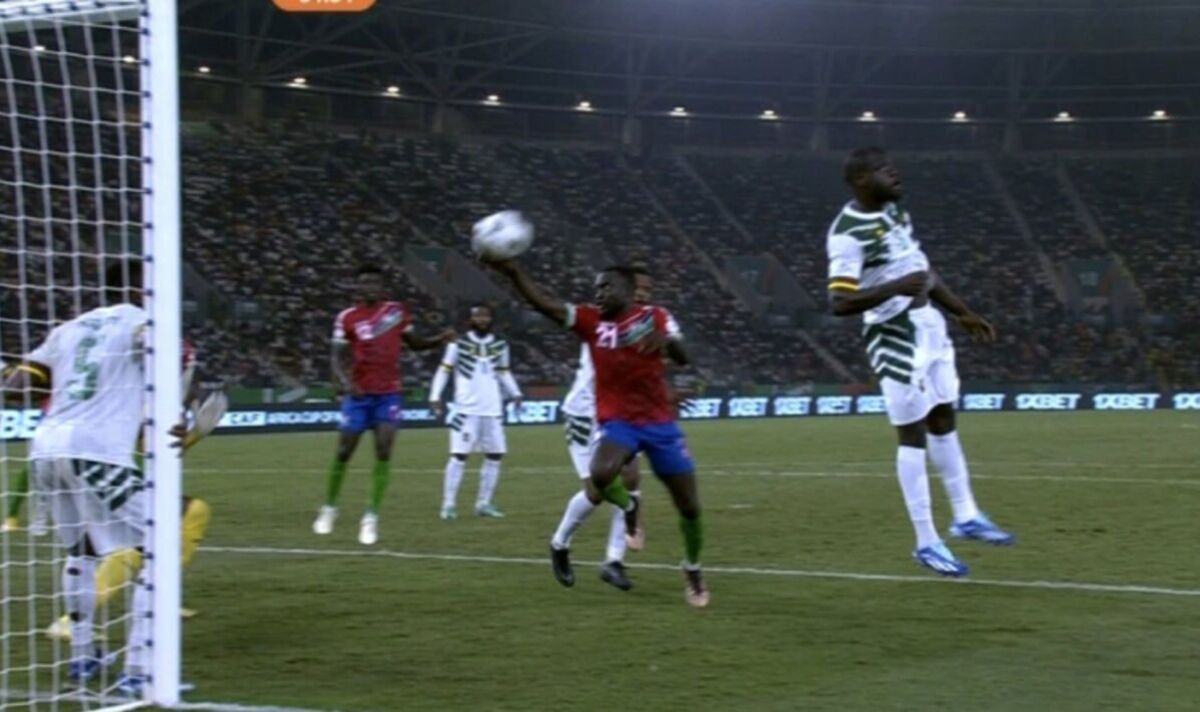 AFCON chaos as Cameroon reach knockouts after Diego Maradona-esque handball scare
