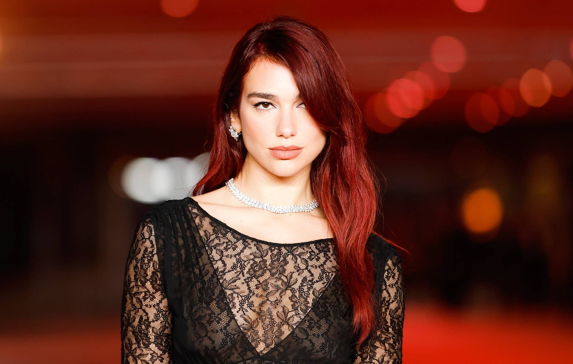 Dua Lipa hits back at jokes about her constantly being on holiday