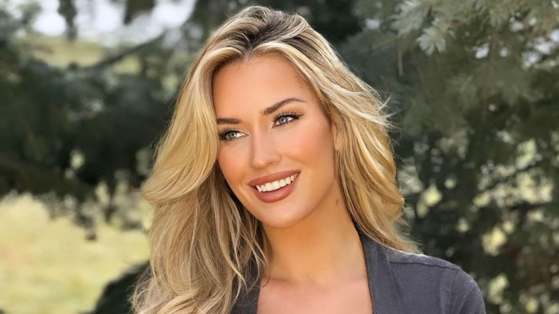 Paige Spiranac puts on busty display in eye-popping crop-top and mini skirt leaving fans in awe