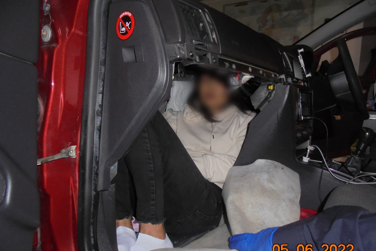 People smuggler who crammed woman behind car dashboard is jailed
