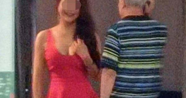 'It's very safe today': Provocatively-dressed women seen approaching men outside People's Park Centre massage parlour 