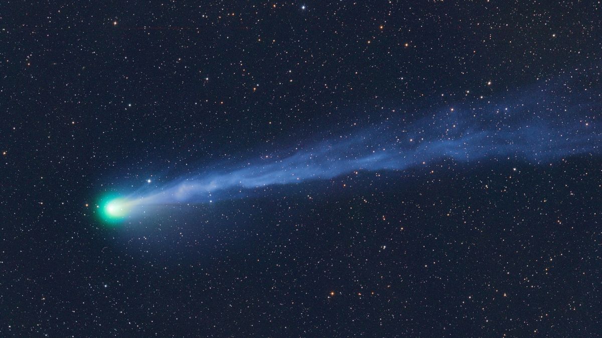 Watch the exploding green 'devil comet' zoom past the Andromeda Galaxy in a stunning livestream this weekend