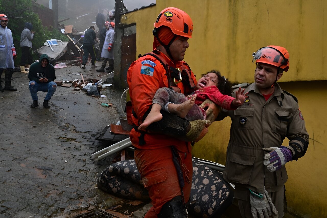 Rescuers race to find trapped people as Brazil storms kill at least 20