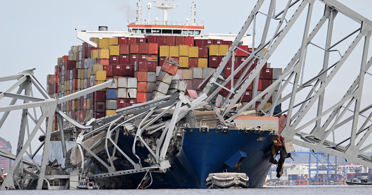 PHOTOS: Baltimore bridge collapses after cargo ship rams into overpass