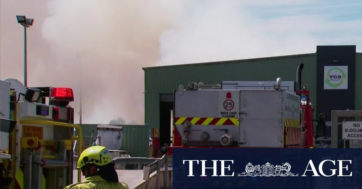 Cardboard factory fire burns for hours