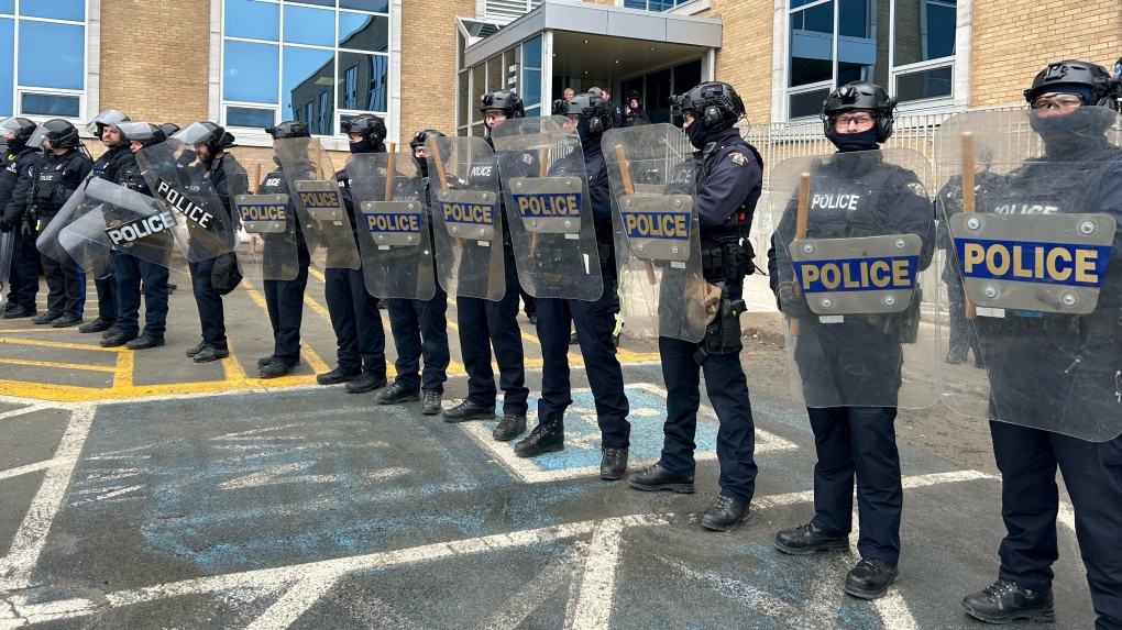 Fish protesters meet riot police outside N.L. legislature, budget delivered in half-empty assembly