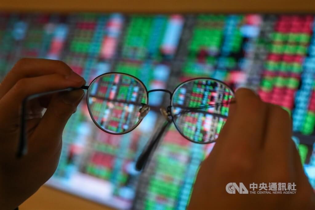 Taiwan shares open little changed