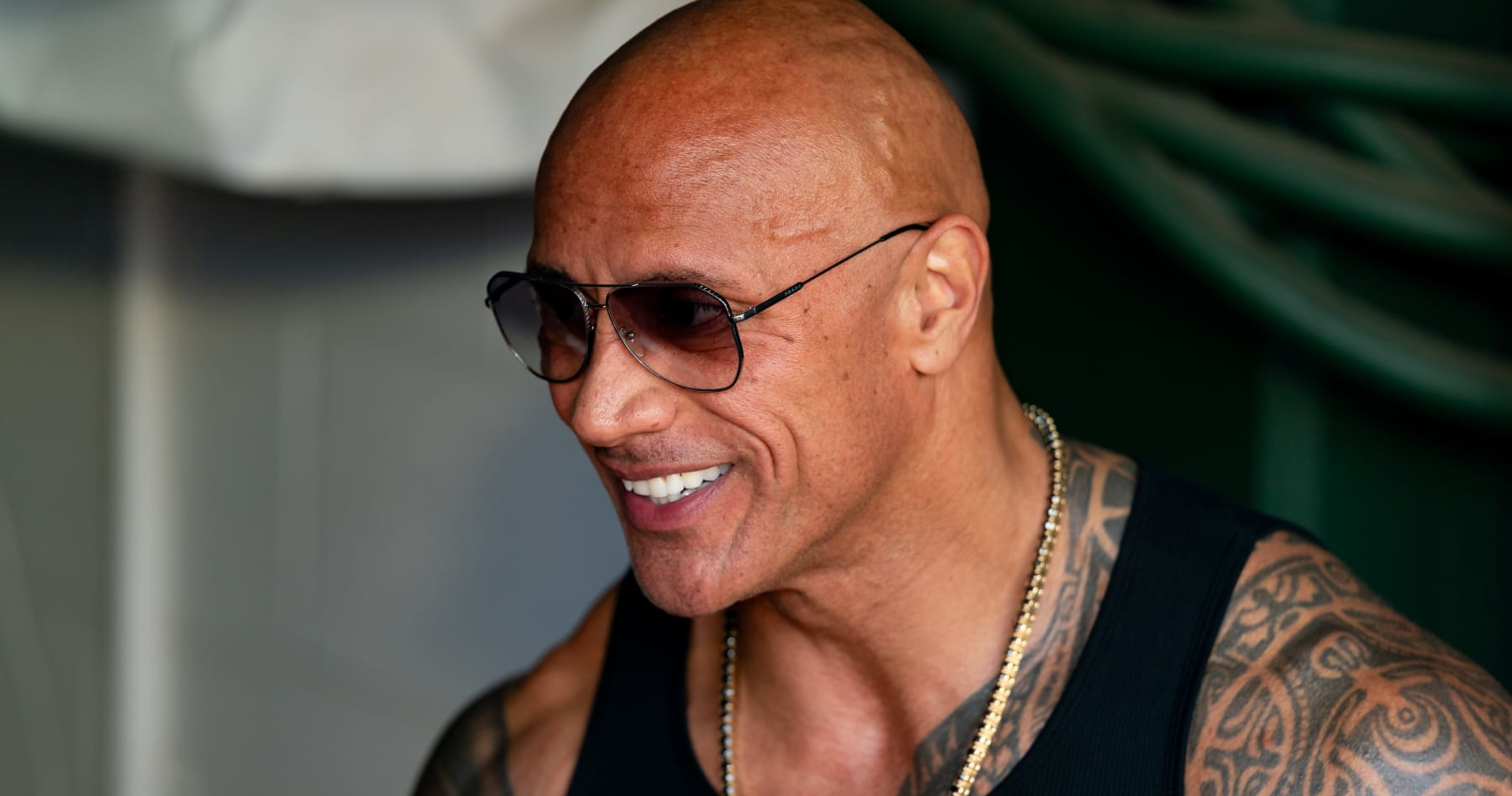 The Rock Gifts Fan with WWE WrestleMania 40 Trip After Tattooing Signature on Arm