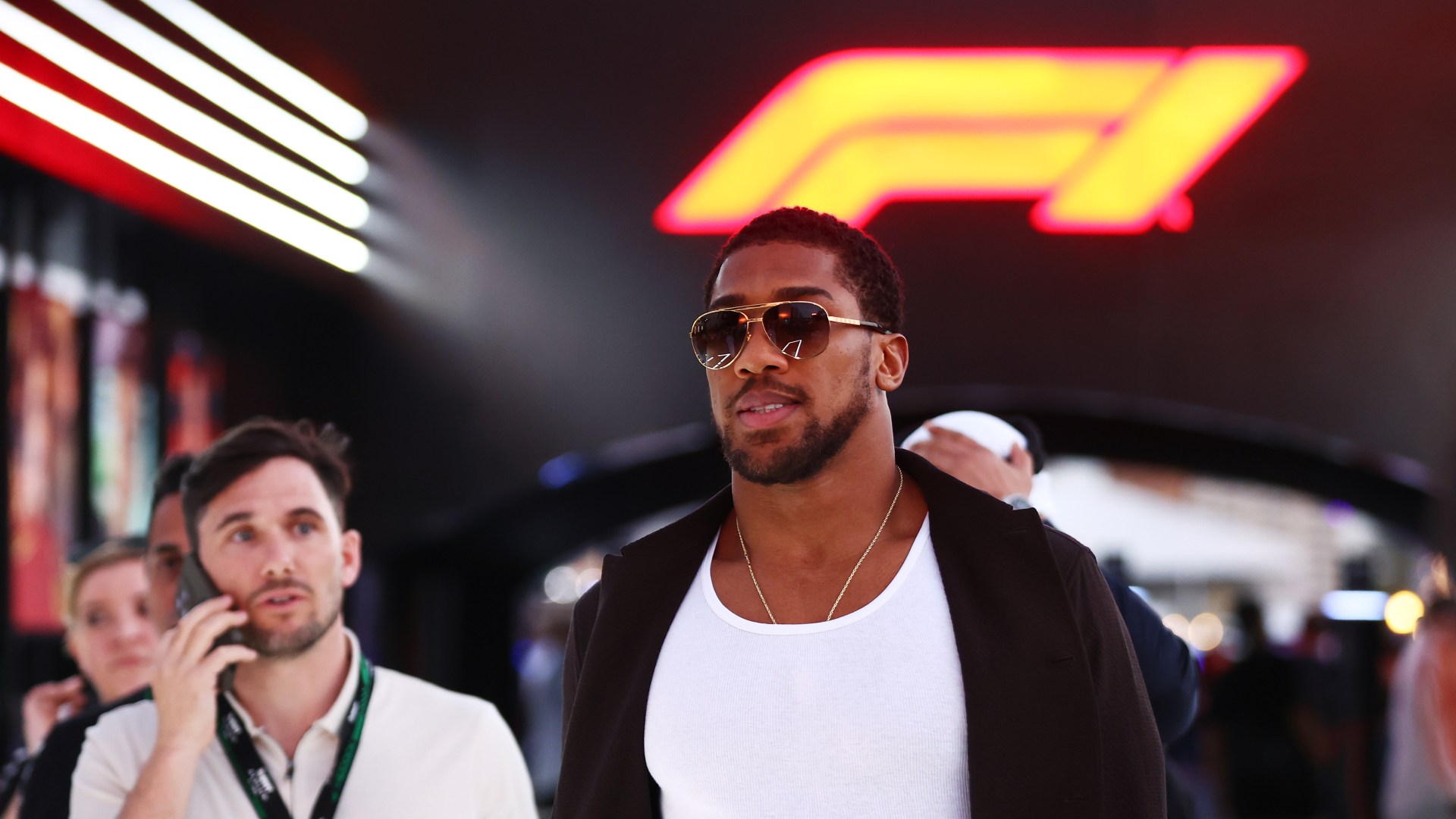 Anthony Joshua arrives at Saudi Arabian GP as he is seen for first time since brutal win over Francis Ngannou