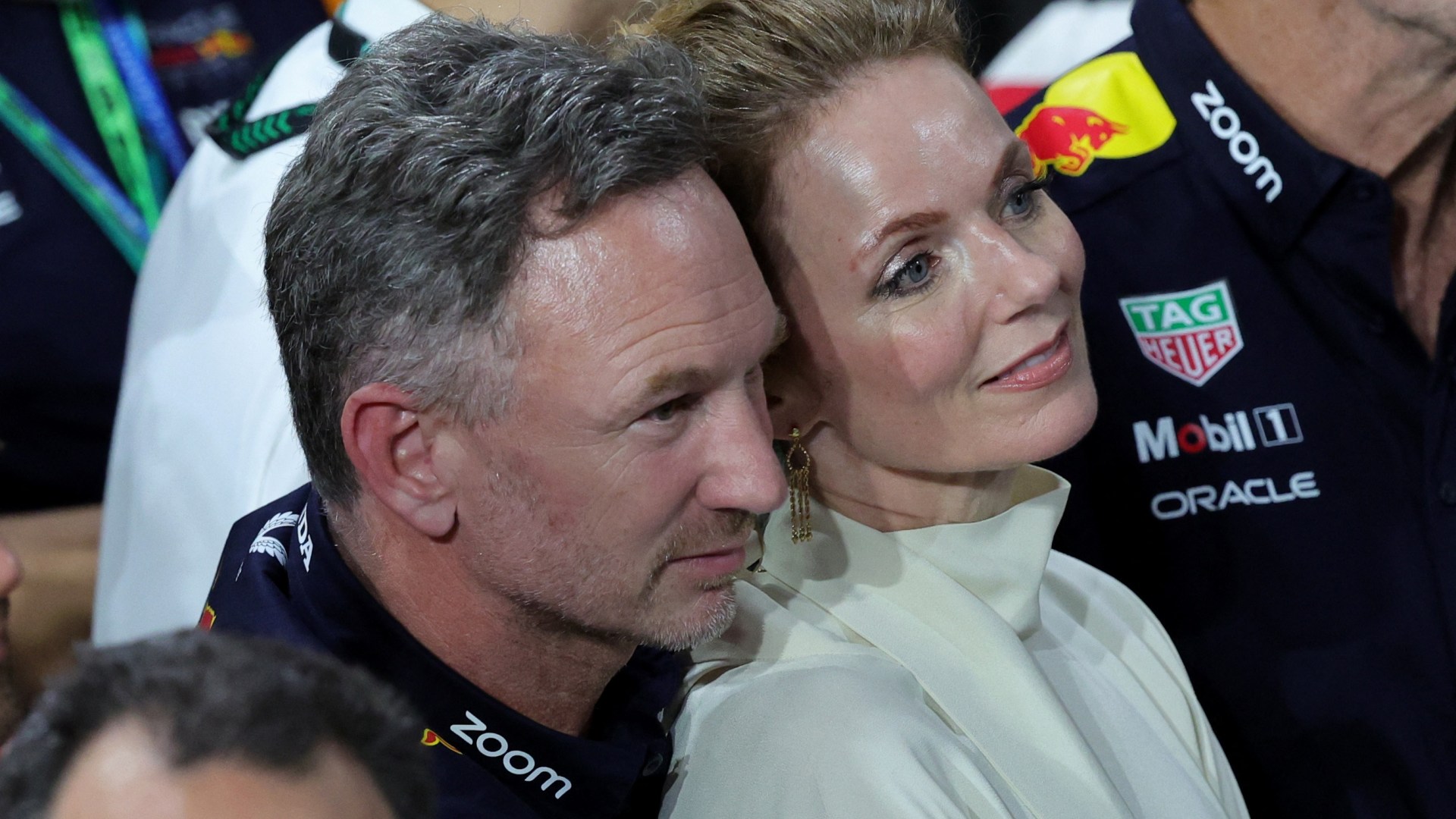 Christian Horner & Geri Halliwell cuddle up as they watch Red Bull podium celebrations at Saudi Arabian Grand Prix