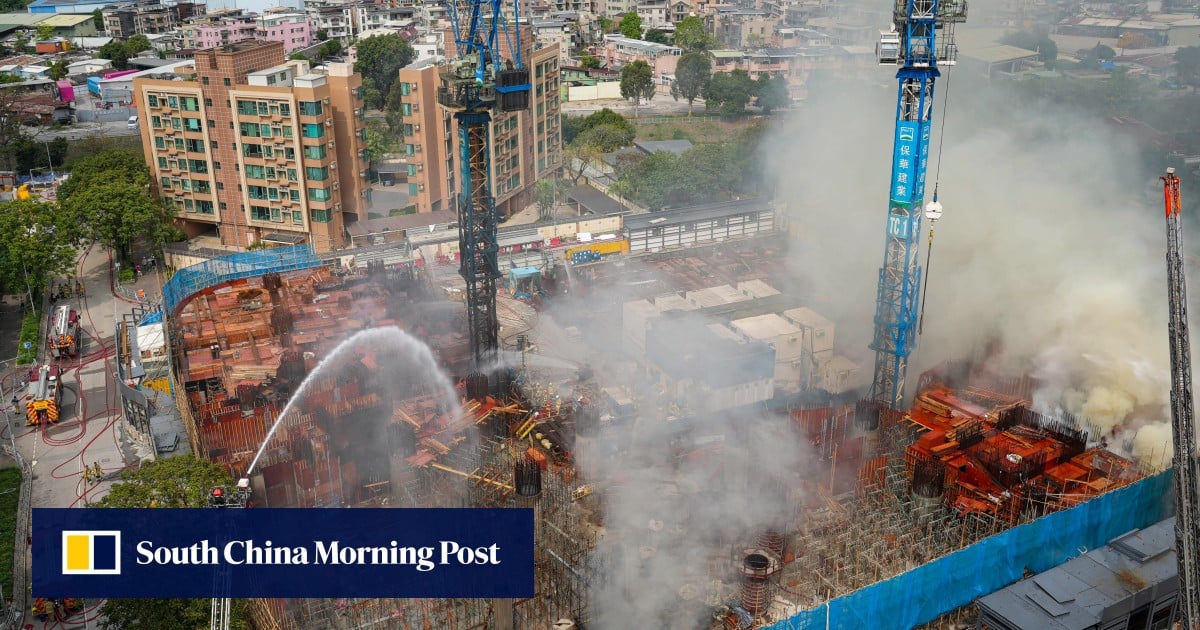Firefighters enter Hong Kong construction site to fight No 4 alarm blaze which has burned for over 24 hours