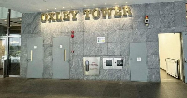 'Almost out of oxygen': Man trapped for over an hour after lift at Oxley Tower plunges 7 storeys