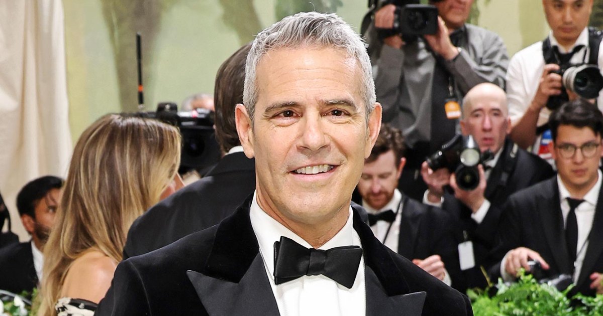 Andy Cohen Reacts to Meme About How He Can't Pose With His Hands