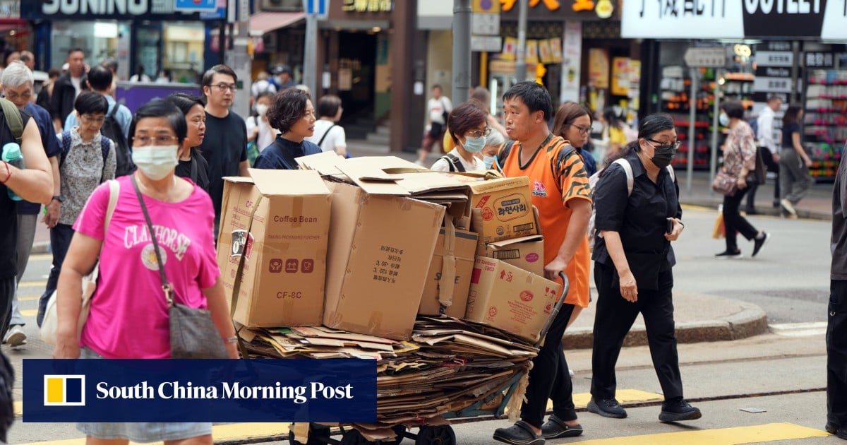 Hong Kong labour chief Chris Sun defends new minimum wage formula, saying employers can afford it