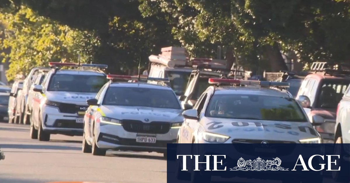 Officers attend school of student shot dead by police
