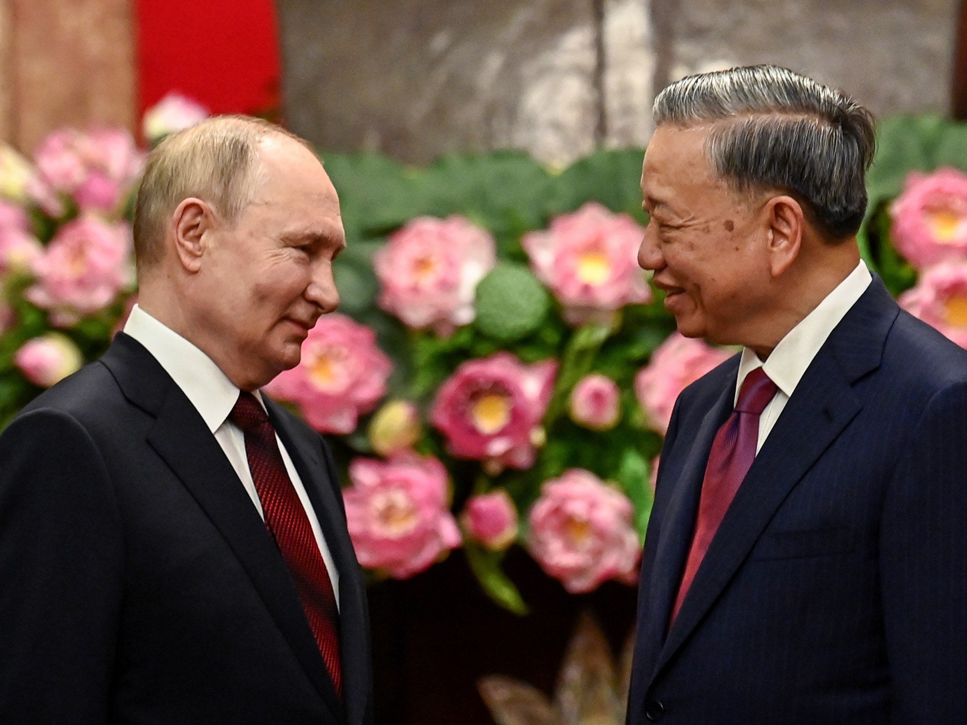 As Putin visits, Vietnam says will boost ties with Russia for global peace