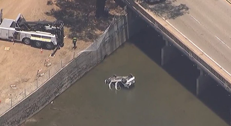 Car goes over bridge, crashes into Mission Bay