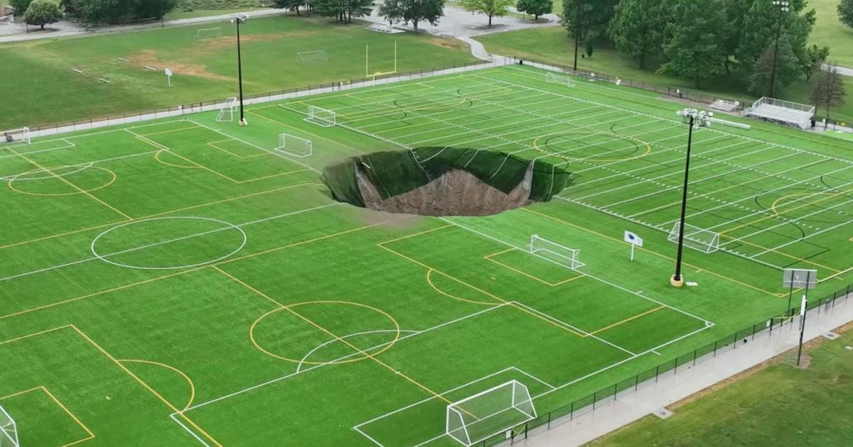 Massive sinkhole swallows Illinois soccer field after mine collapses