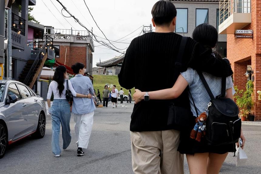 As South Korea's population shrinks, same-sex couples say they can help
