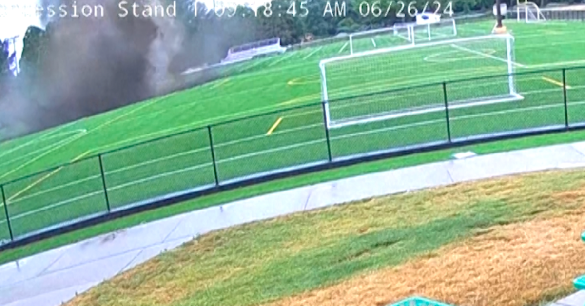 Giant Sinkhole Swallows the Center of a Soccer field in Illinois
