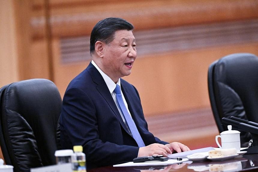 China's Xi calls for 'bridges' amid trade, diplomatic frictions