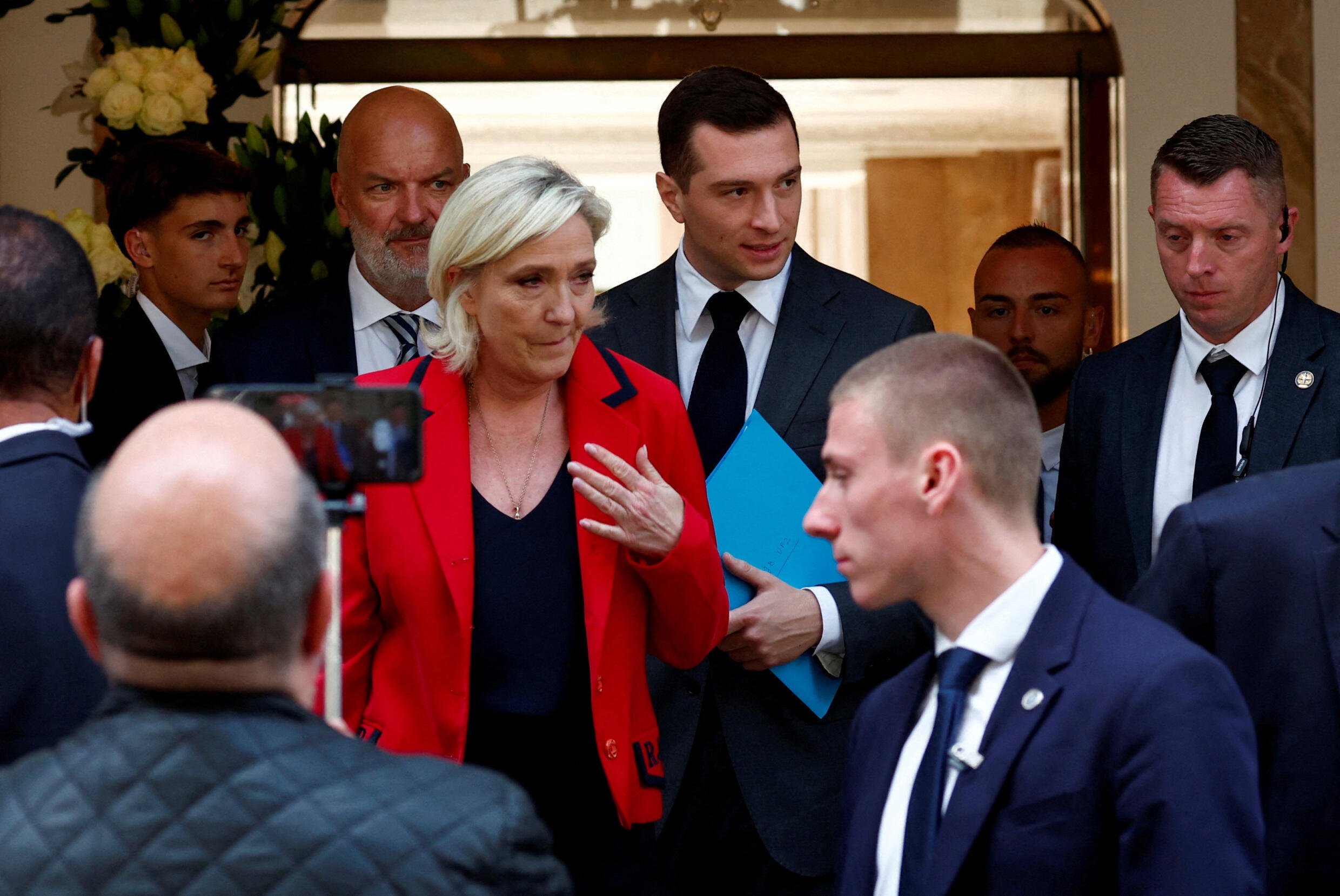 Far-right leader Le Pen questions French president's role as army chief