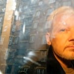 Founder Julian Assange stops in Bangkok on his way to a US court and later freedom