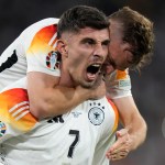 Host Germany gives tournament liftoff by outclassing 10-man Scotland 5-1