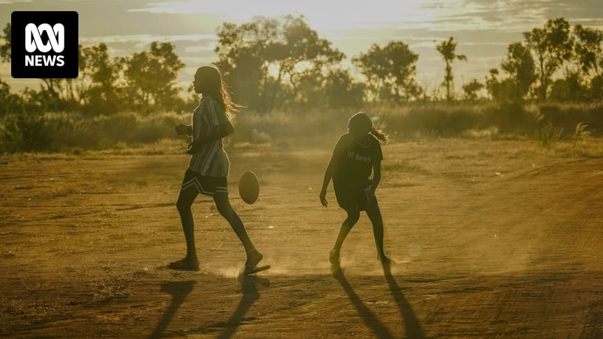 In the outback community of Alpurrurulam, footy is more religion than sport for these young women