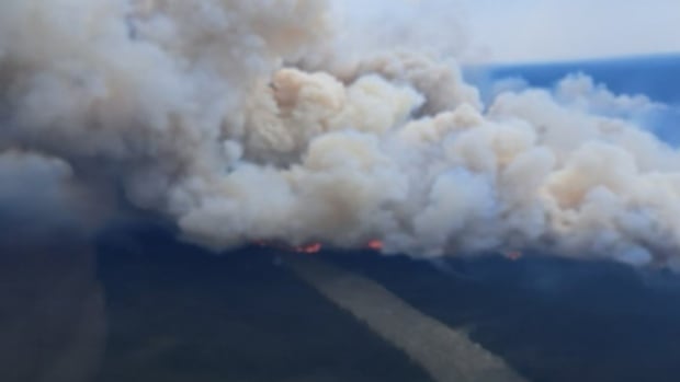 Rain in forecast for Churchill Falls after wildfire jumps N.L. river, prompting full evacuation