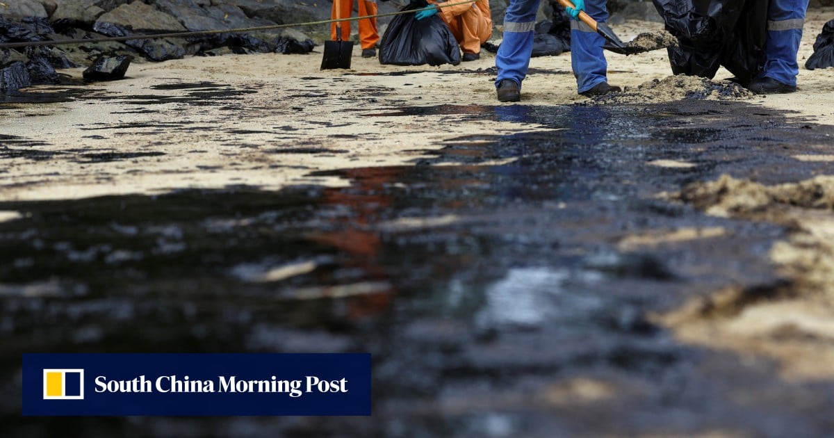 Singapore races to clean-up oil slick from resort island of Sentosa, nature reserve
