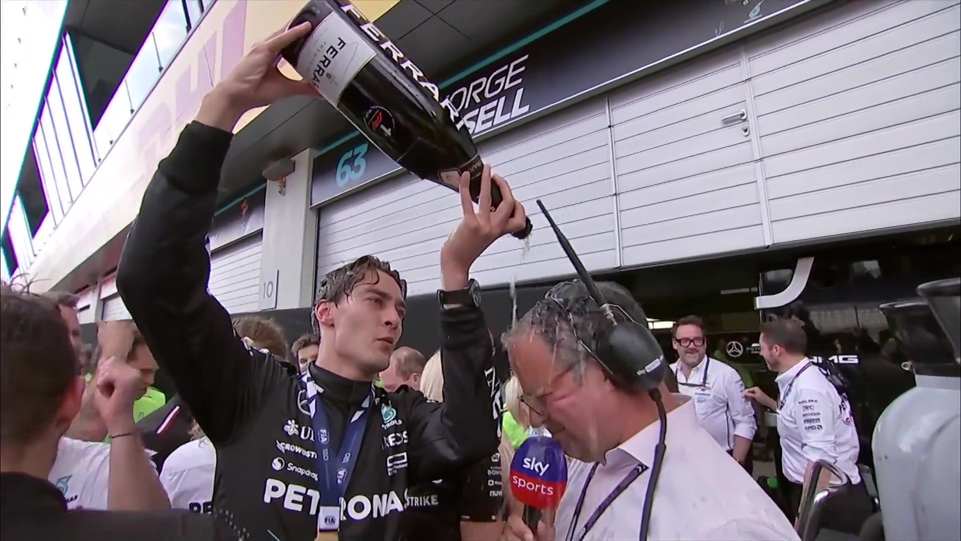Watch moment George Russell pours champagne all over Sky Sports reporter and then refuses to give him an interview
