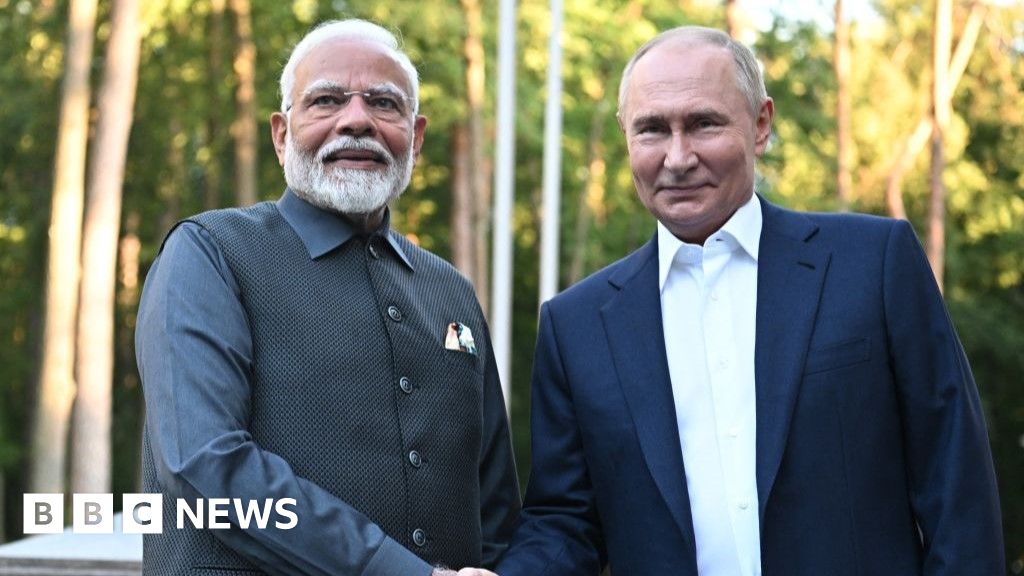 Modi's balancing act as he meets Putin in Moscow