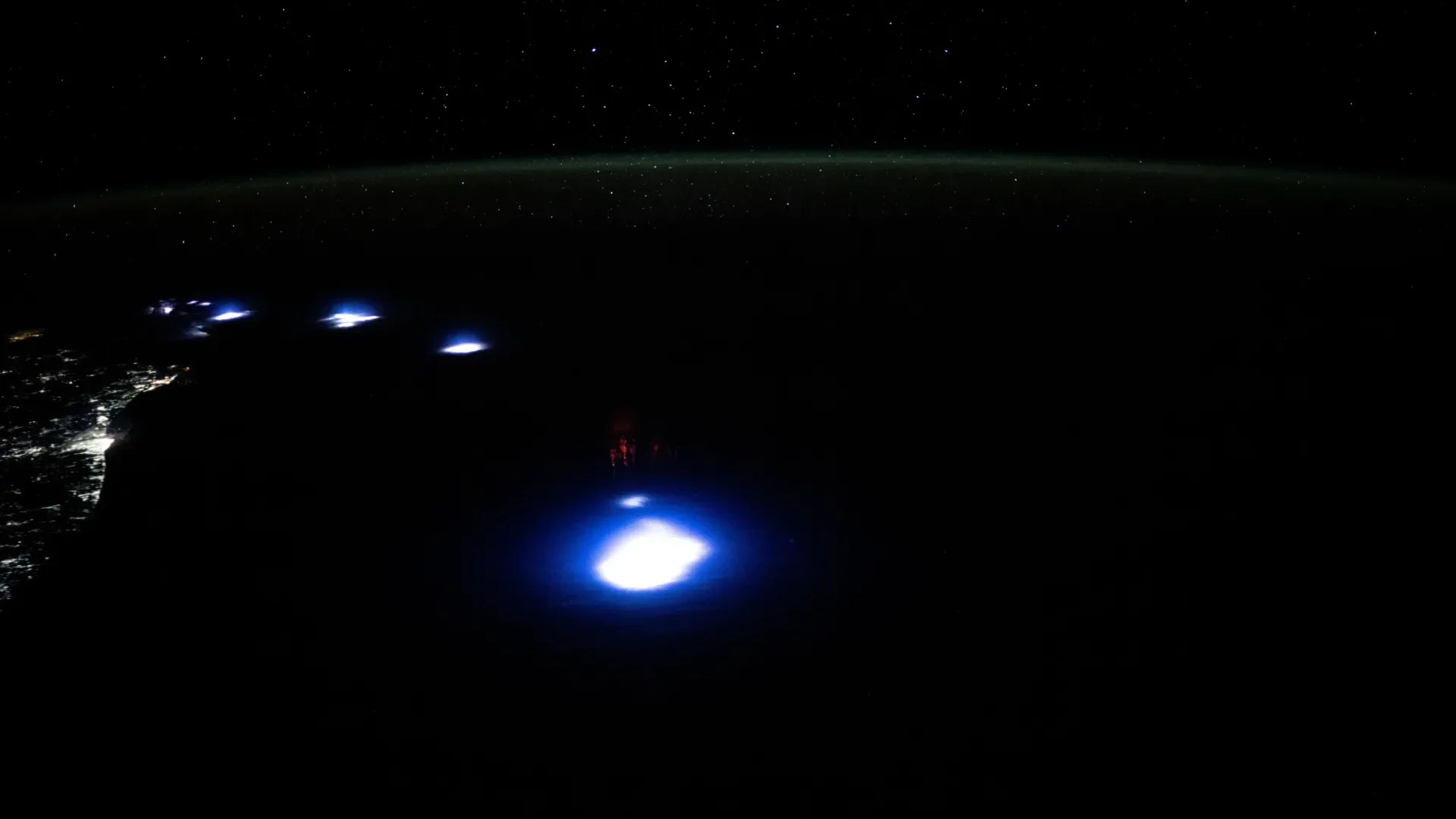 Mysterious Glowing Orbs Spotted from the ISS Look Like Alien Spaceships