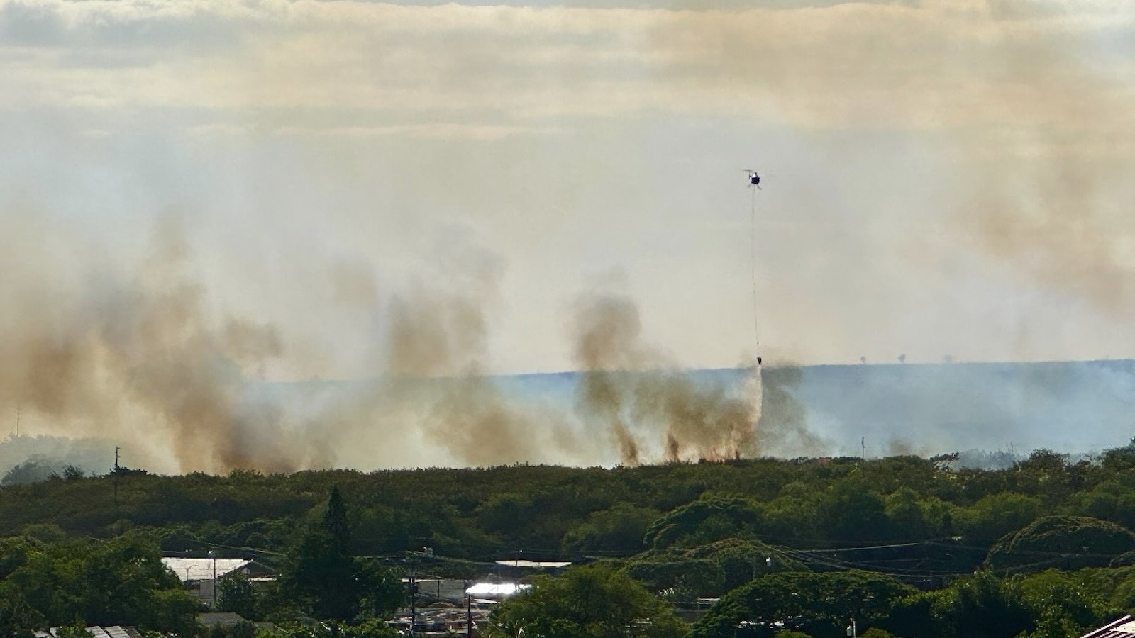 Fast-moving brush fire now contained on Hawaii's Kauai Island, evacuations lifted