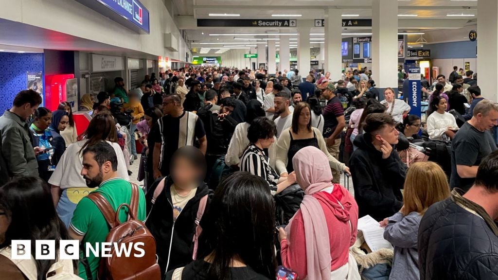 Watch: Blackout and huge crowds stuck at Manchester Airport