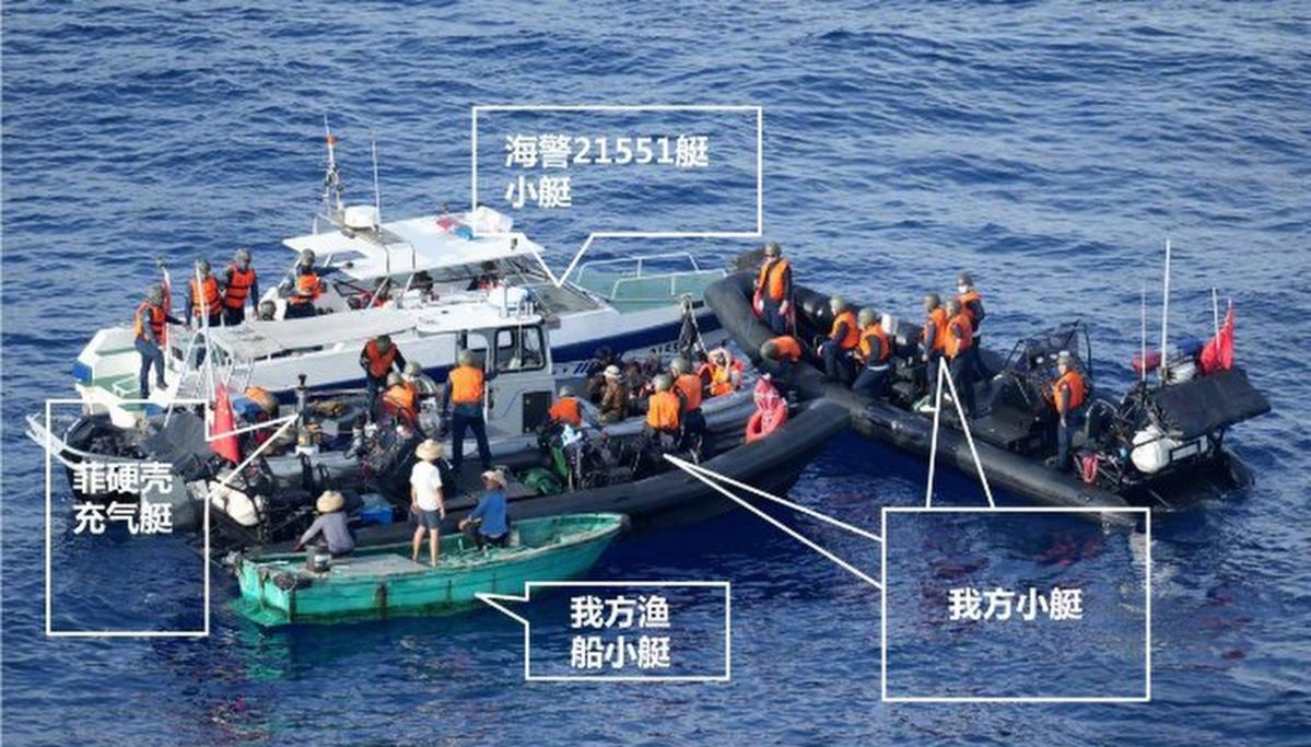 South China Sea: photos show Chinese coastguard encircled, boarded Philippine boat