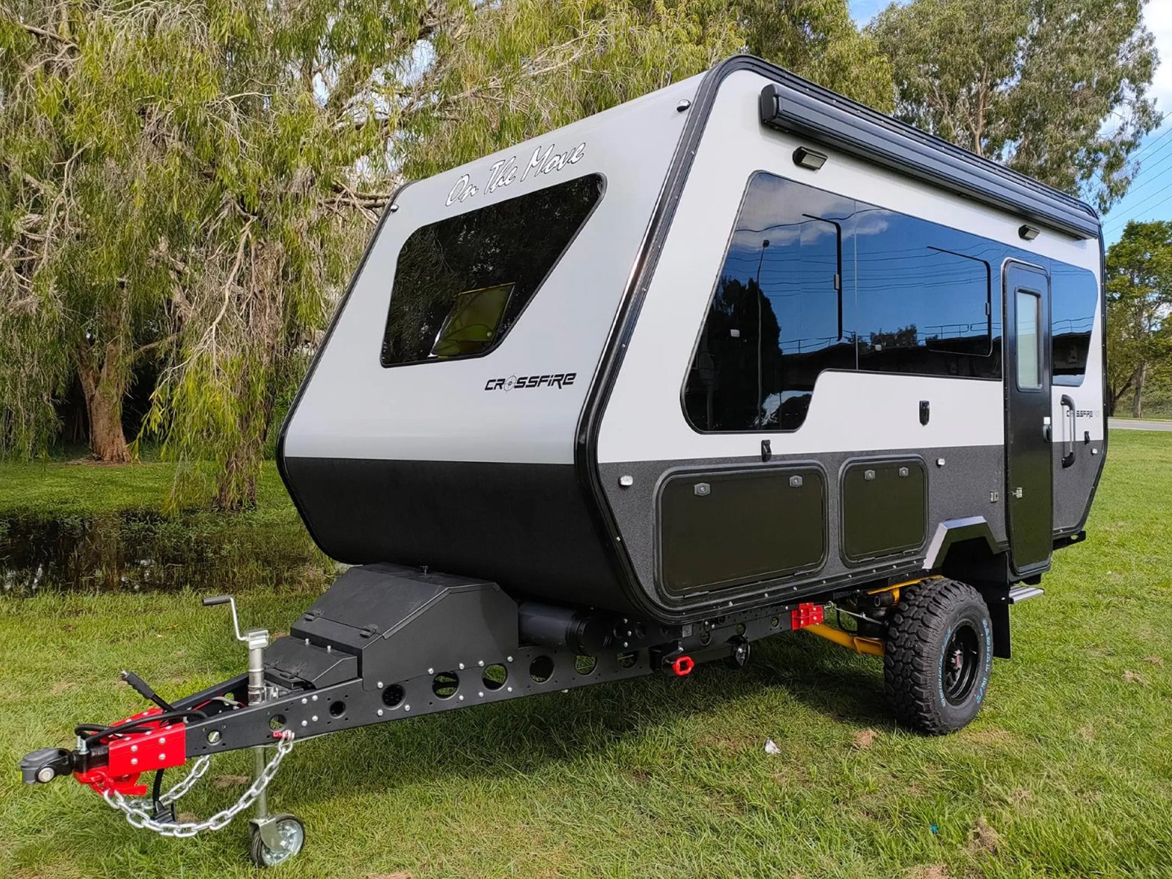 Crossfire 4.7 trailer with dual kitchen and array of windows is crafted for rugged exploration